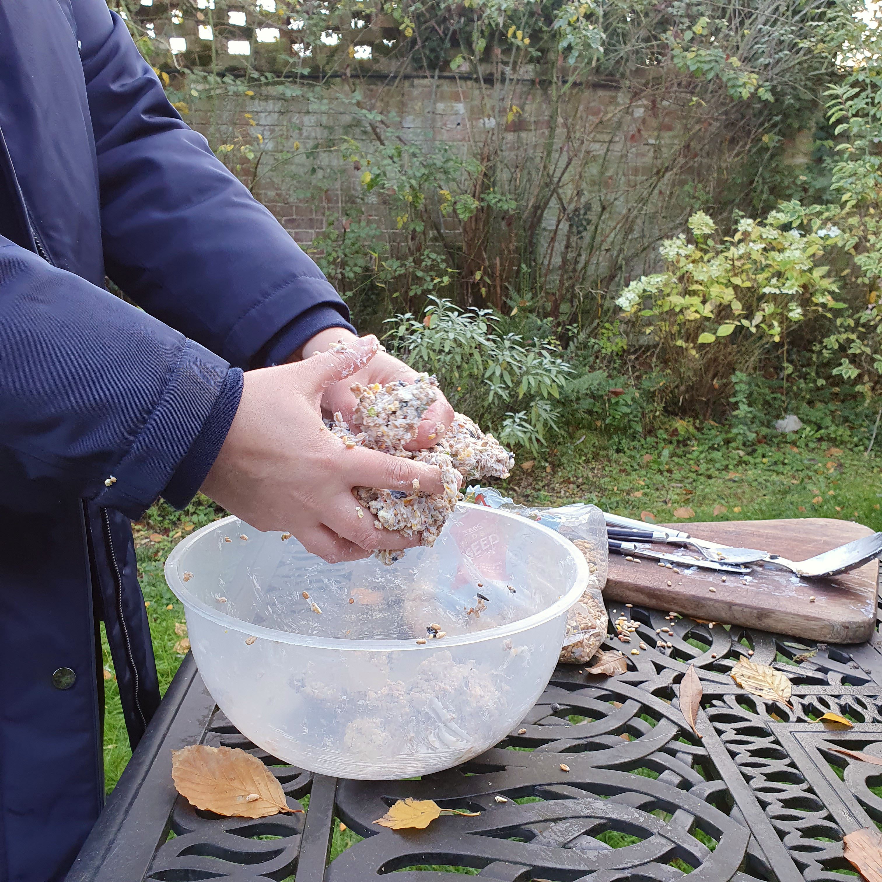 Mixing and forming seed cakes by hand
